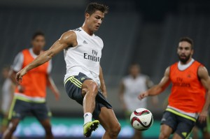 Cristiano Ronaldo of Real Madrid fights for the ball during a training session ahead of a friendly soccer match against AC Milan in Shanghai