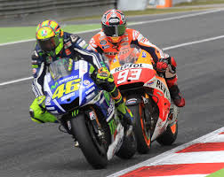 Marquez belum menyerah kejar Rossi dan Lorenzo. (Foto: AFP/Manan Vatsyayana)