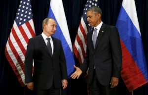 Presiden Rusia Vladimir Putin dan Presiden AS Barack Obama terlihat canggung dalam foto yang diambil pada Sidang Umum PBB. (Foto: Reuters)
