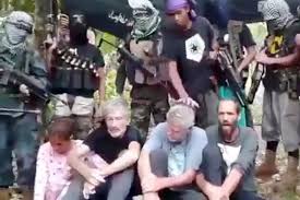 Tiga orang sandera Kelompok Abu Sayyaf: Robert Hall, John Ridsdel dan Kjartan Sekkingstad. (Foto: Reuters)
