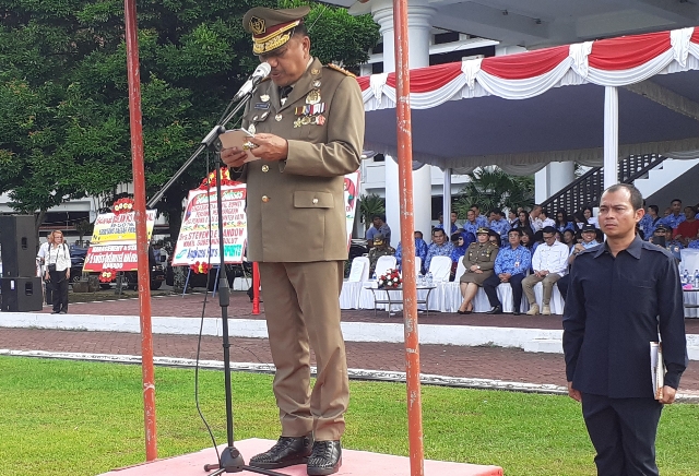 Gubernur Olly Dondokambey SE saat membacakan pesan Menteri Ketenagakerjaan RI Ida Fauziyah pada Peringatan Hari K3 Nasional Tahun 2020, Senin (17/02/2020)