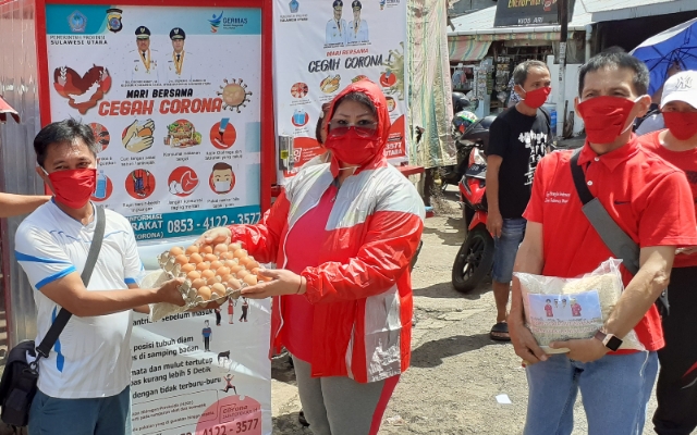 Bantuan Keluarga Olly Dondokambey Tamuntuan dan Keluarga Steven Kandouw-Tanos diserahkan kepada Tukang Ojek Pangkalan