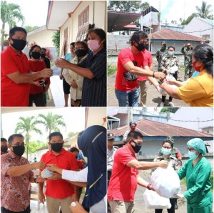 Pemberian bantuan APD berstandar WHO oleh Fraksi PDIP di DPRD Minut.