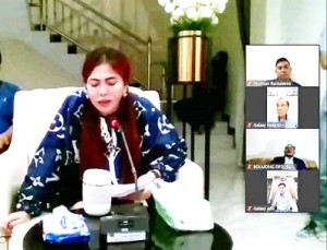 Vonnie Panambunan saat melakukan VidCon dengan pengurus partai Nasdem se Sulut.