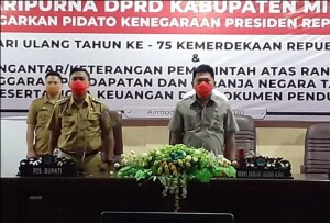 Pjs. Bupati Minut Clay Dondokambey dan Ketua DPRD Minut Denny Lolong.