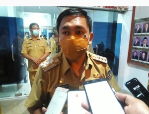 Pjs. Bupati Minut Clay Dondokambey