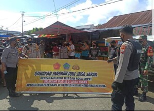 Sosialisasi Protokol Kesehatan oleh Polres Minut di Pasar Tradisional Airmadidi belum lama ini.