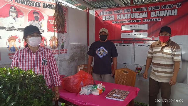Mody Dotulong, Hukum Tua Desa Kaayuran Bawah Kecamatan Langowan Selatan (kiri)